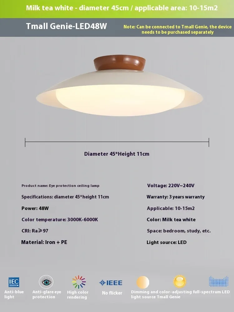 Modern cream style flying saucer shaped ceiling lamp in an iron shade.