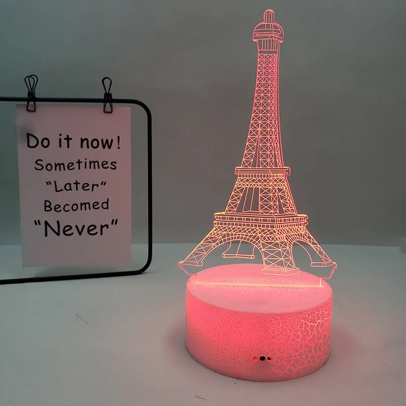 Eiffel Tower themed table lamp with multicolour LED glow on a acrylic shade.