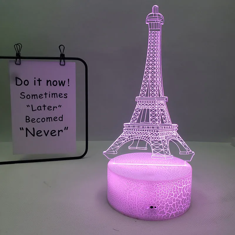 Eiffel Tower themed table lamp with multicolour LED glow on a acrylic shade.