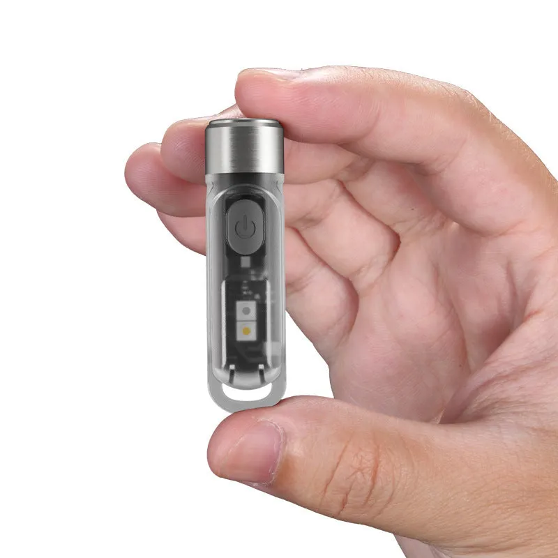 Green Nitecore TIKI USB rechargeable keychain torch with three LED light sources: main, white, and UV.