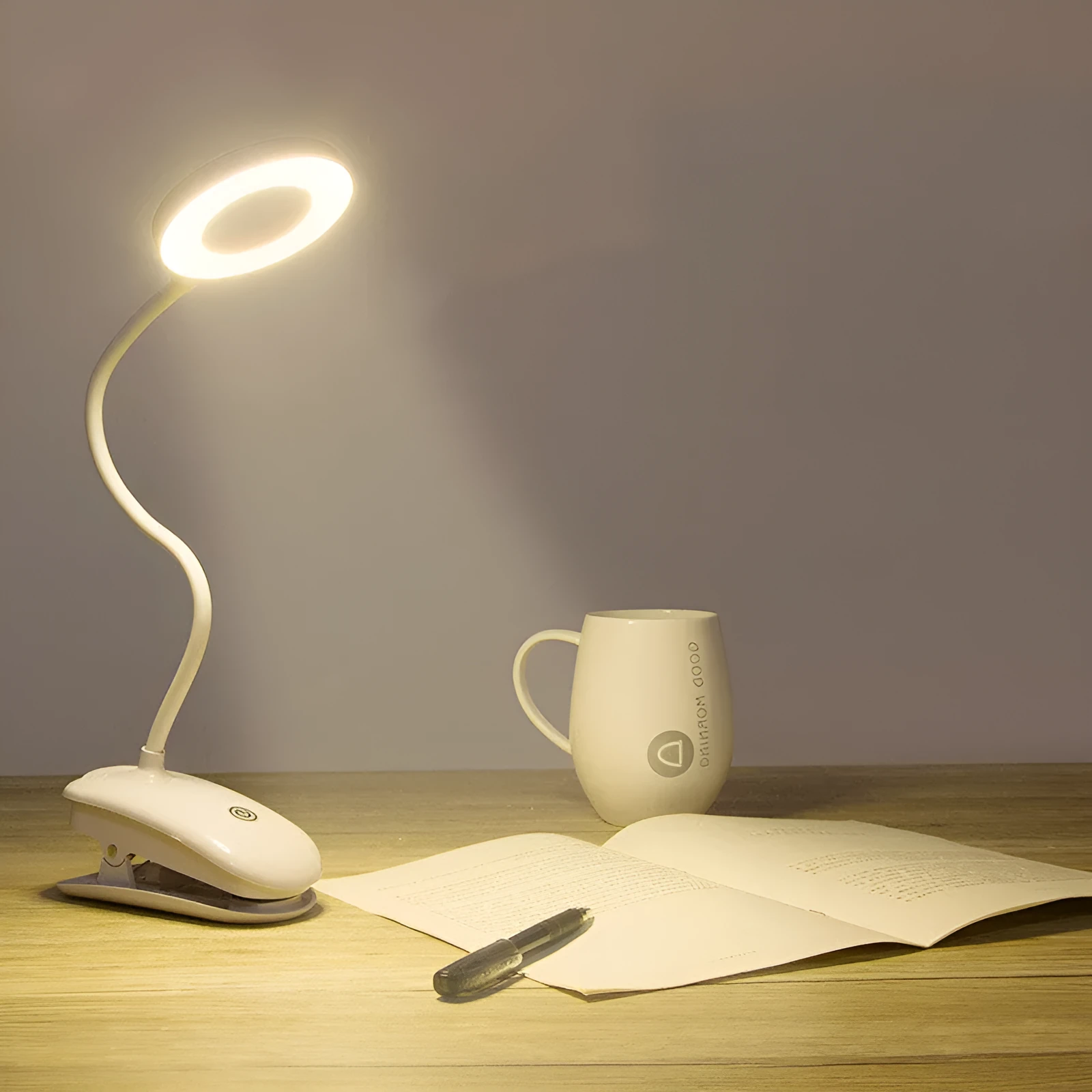 Clip-on rechargeable desk lamp with touch controls showing modern minimalist design
