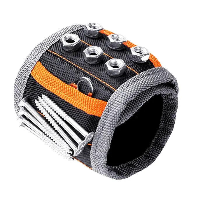 Black Oxford cloth magnetic tool wristband with 15 grid pockets and Velcro strap laid flat