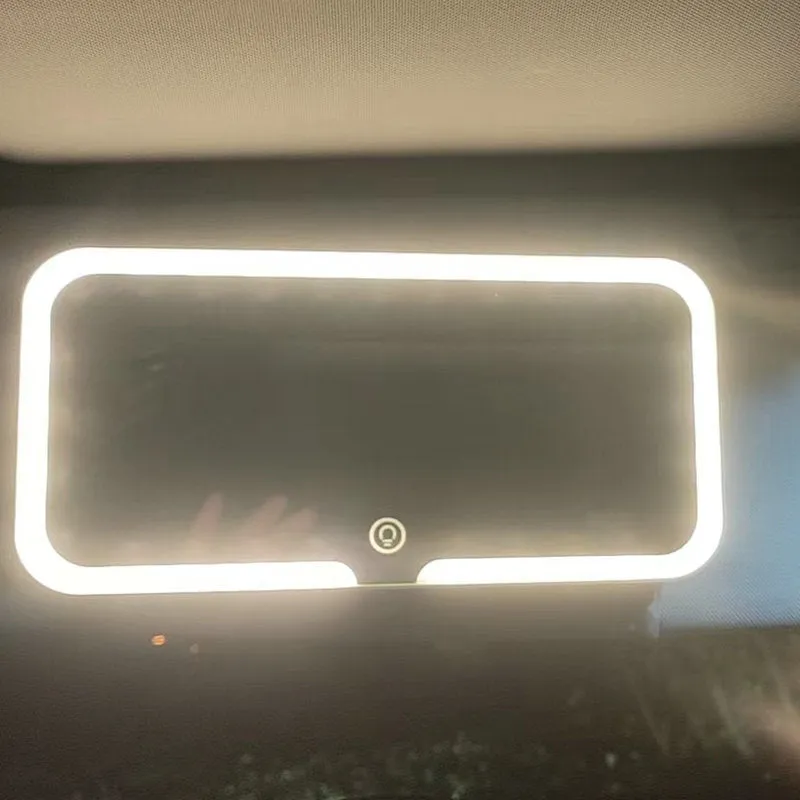 White ABS plastic car sun visor with LED light and aluminium makeup mirror.