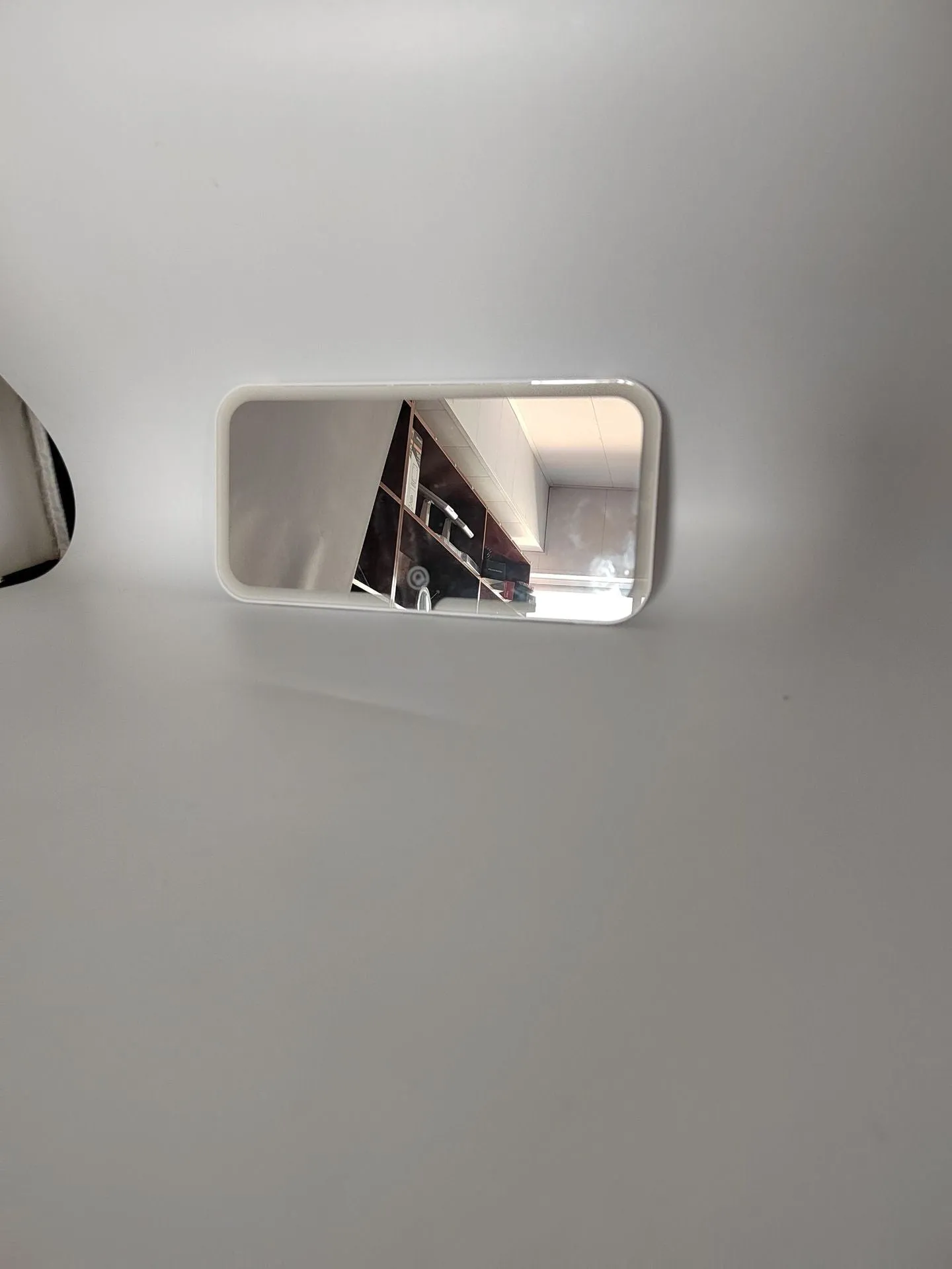White ABS plastic car sun visor with LED light and aluminium makeup mirror.