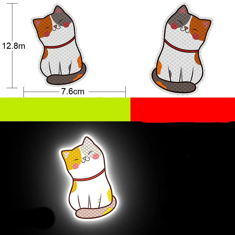 A pair of diamond-grade reflective safety stickers for vehicles, showing sample designs like a smiling cat or tiger.