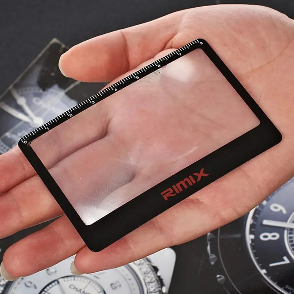 Credit card sized plastic magnifier in black or white colour for portable reading assistance