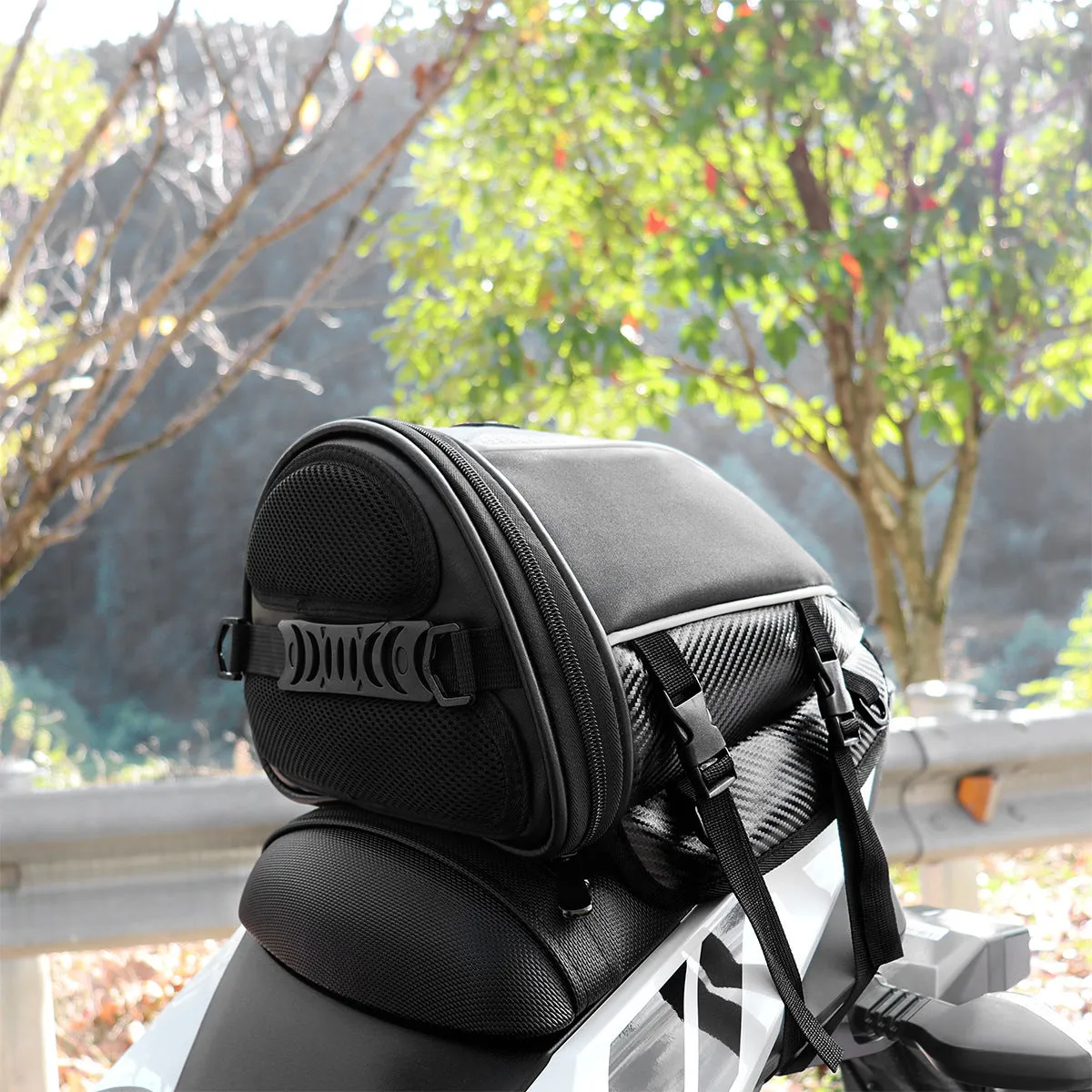 Black waterproof motorcycle crossbody bag with reflective strips and multiple pockets