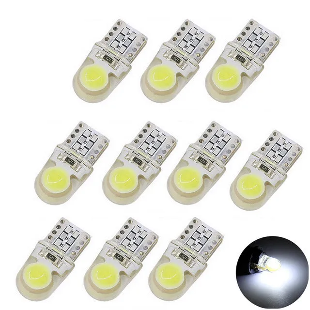 Ten T10 LED bulbs for cars in various colours including blue, red, and white, showing their 21.5mm length.