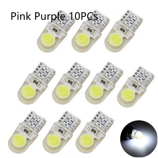 Ten T10 LED bulbs for cars in various colours including blue, red, and white, showing their 21.5mm length.