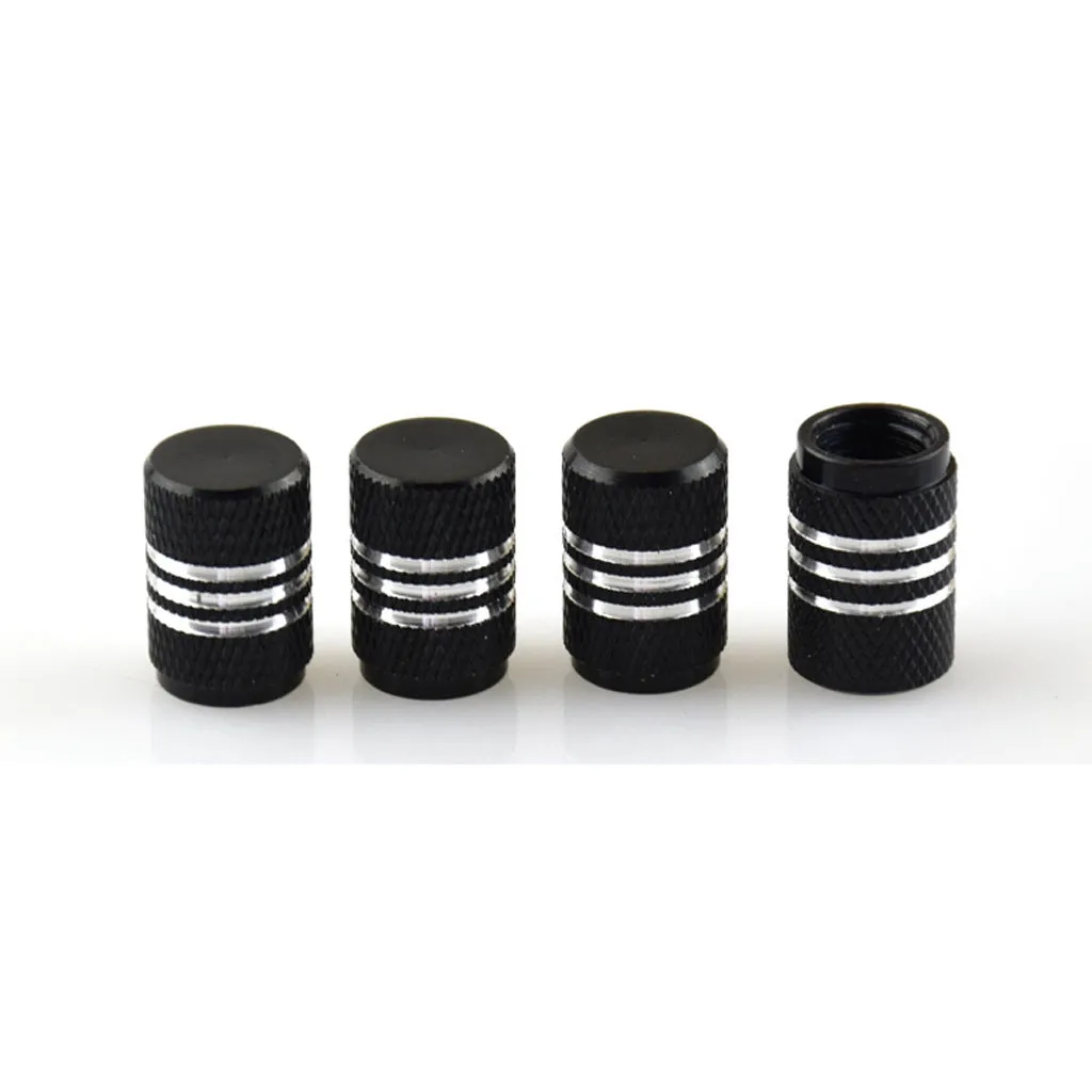 Set of aluminium alloy car tyre valve caps in multiple colours including red, blue, silver, and black.