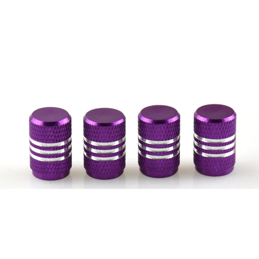 Set of aluminium alloy car tyre valve caps in multiple colours including red, blue, silver, and black.