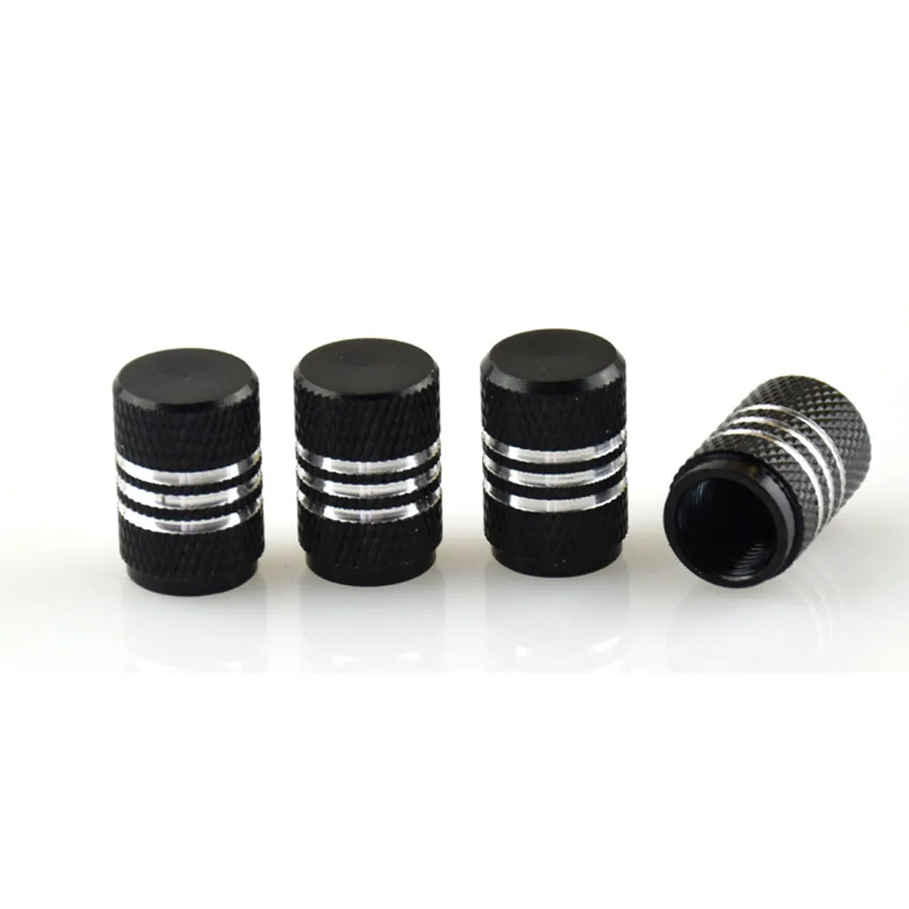 Set of aluminium alloy car tyre valve caps in multiple colours including red, blue, silver, and black.