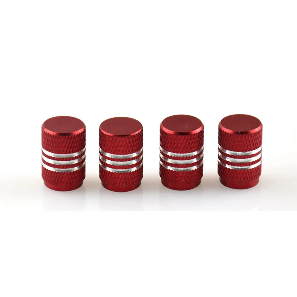 Set of aluminium alloy car tyre valve caps in multiple colours including red, blue, silver, and black.