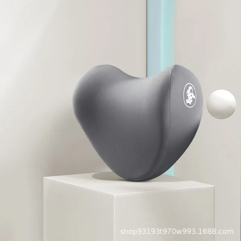 Heart-shaped car pillow in choice of colours, shown as headrest and lumbar support on a car seat.