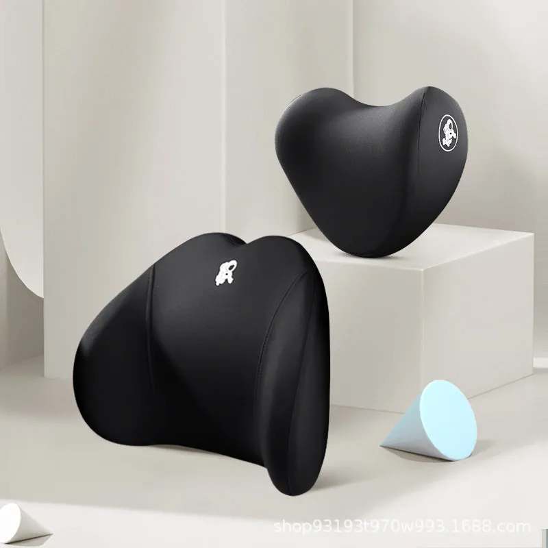 Heart-shaped car pillow in choice of colours, shown as headrest and lumbar support on a car seat.