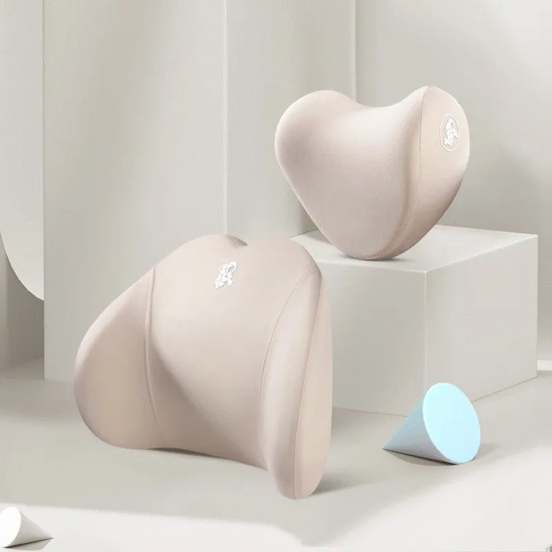 Heart-shaped car pillow in choice of colours, shown as headrest and lumbar support on a car seat.