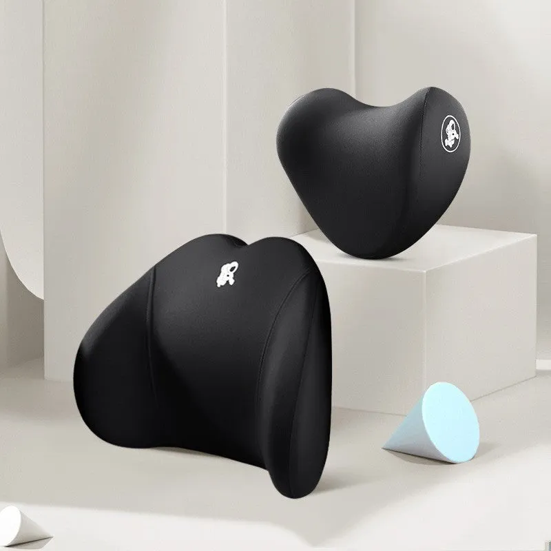 Heart-shaped car pillow in choice of colours, shown as headrest and lumbar support on a car seat.