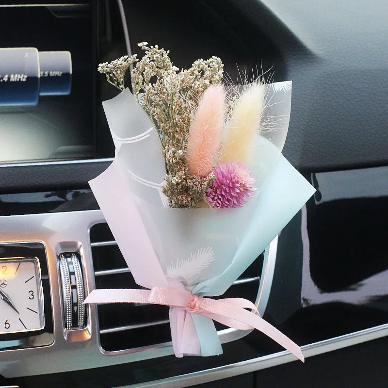 Dried flower bouquet and scented slice car air freshener set for air vents in various colours.