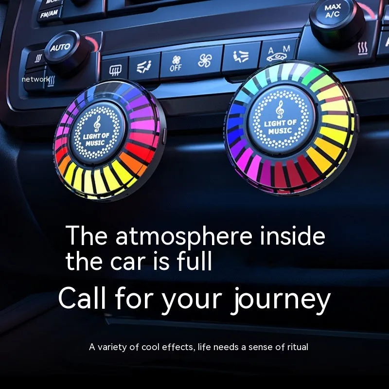 Black square desktop magnetic RGB ambience light with 60cm dimensions on a car dashboard