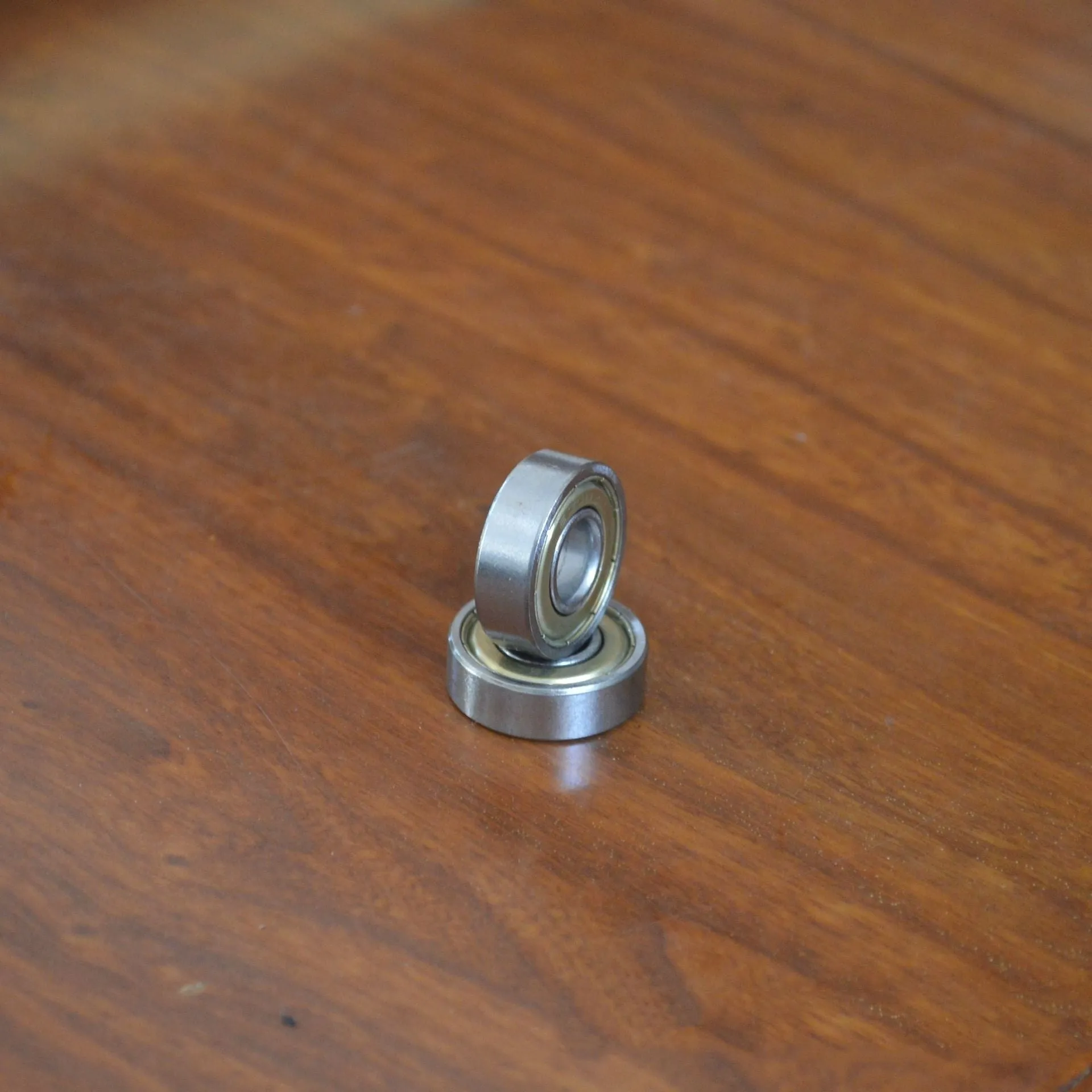 6000zz carbon steel ball bearing showing 10x26x8mm dimensions and iron retainer