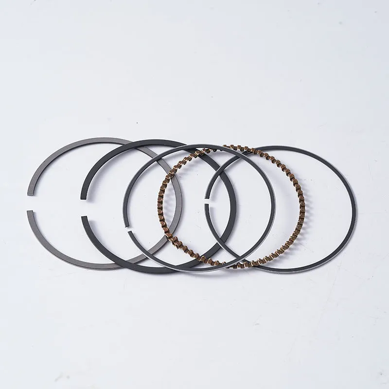 Motorcycle engine piston kit showing aluminium alloy construction with 57.4mm diameter measurement