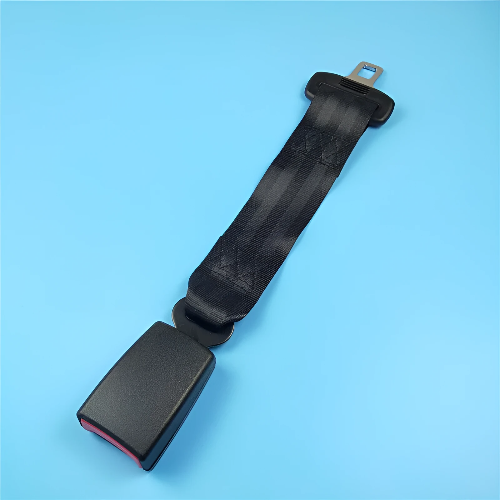 Black 36cm ribbon car seat belt extender for children and pregnant women.