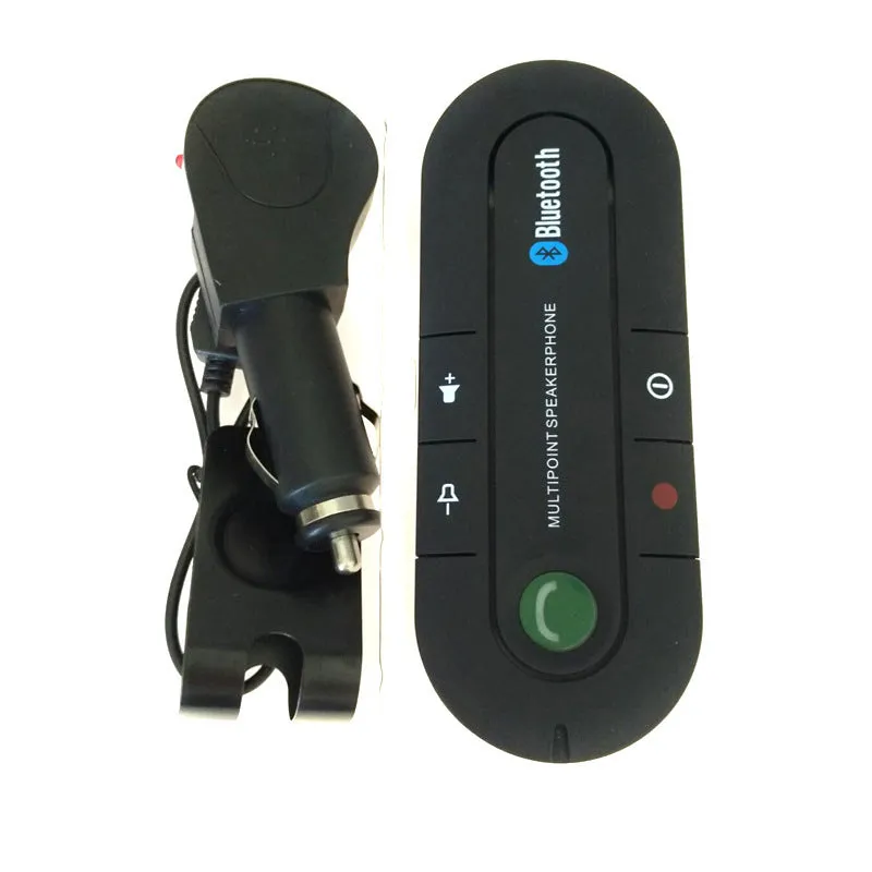 Black vehicle-mounted Bluetooth handsfree and music player device attached to a car sun visor.