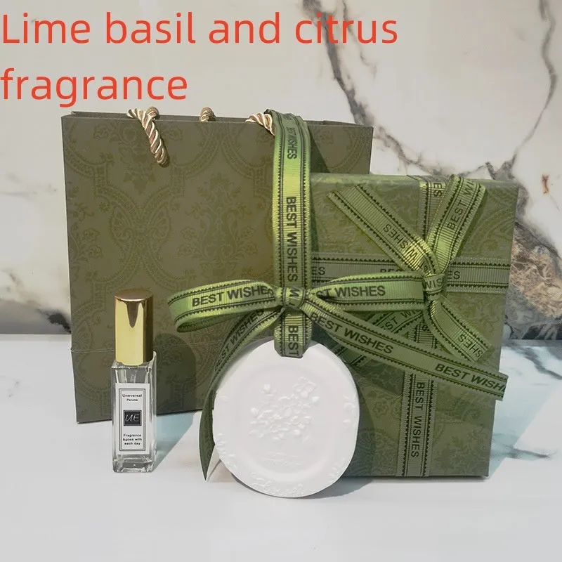 Car aromatherapy pendant set with stone diffuser, 10ml essential oil bottle, gift box, and handbag.