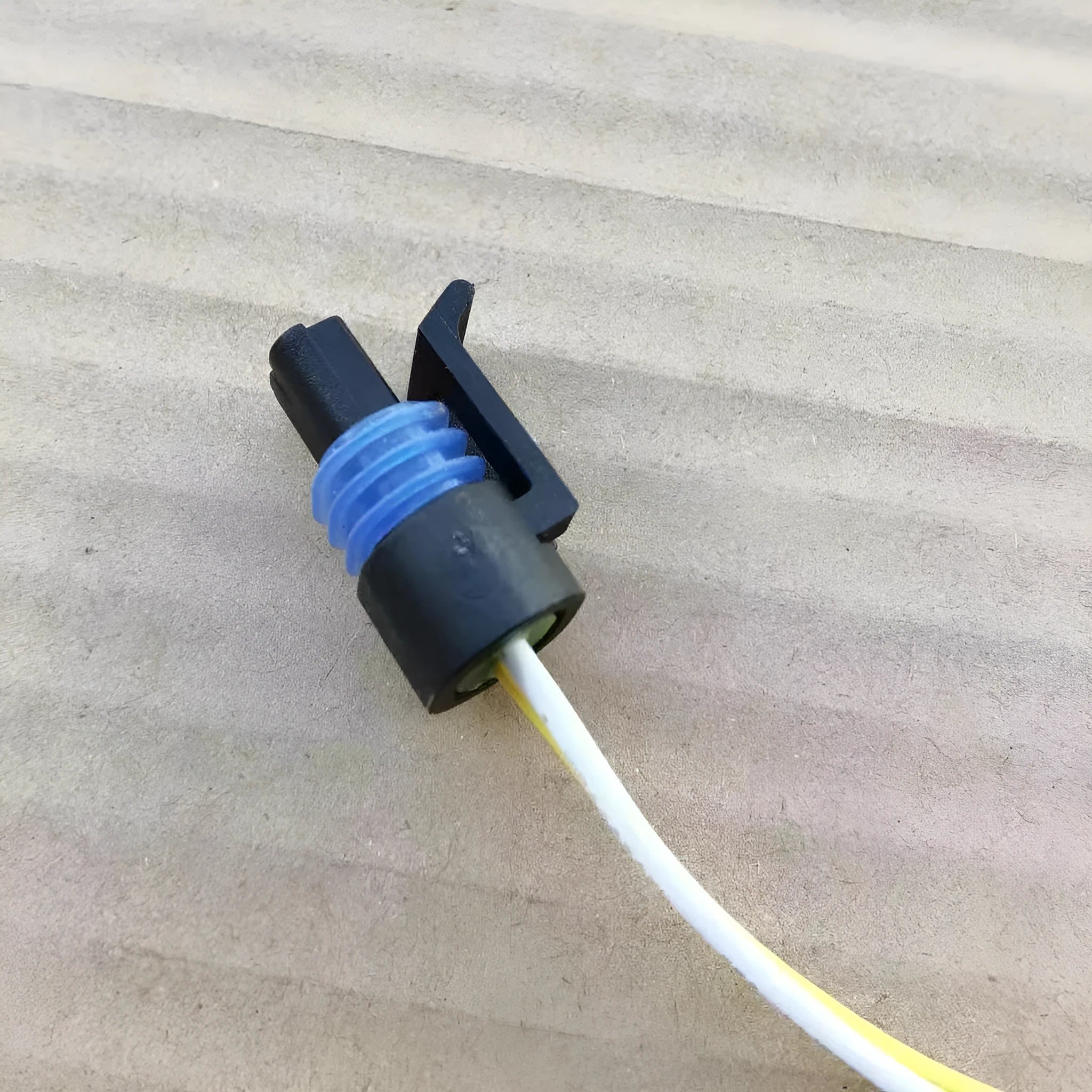 ACDelco branded car engine water temperature sensor plug replacement part.