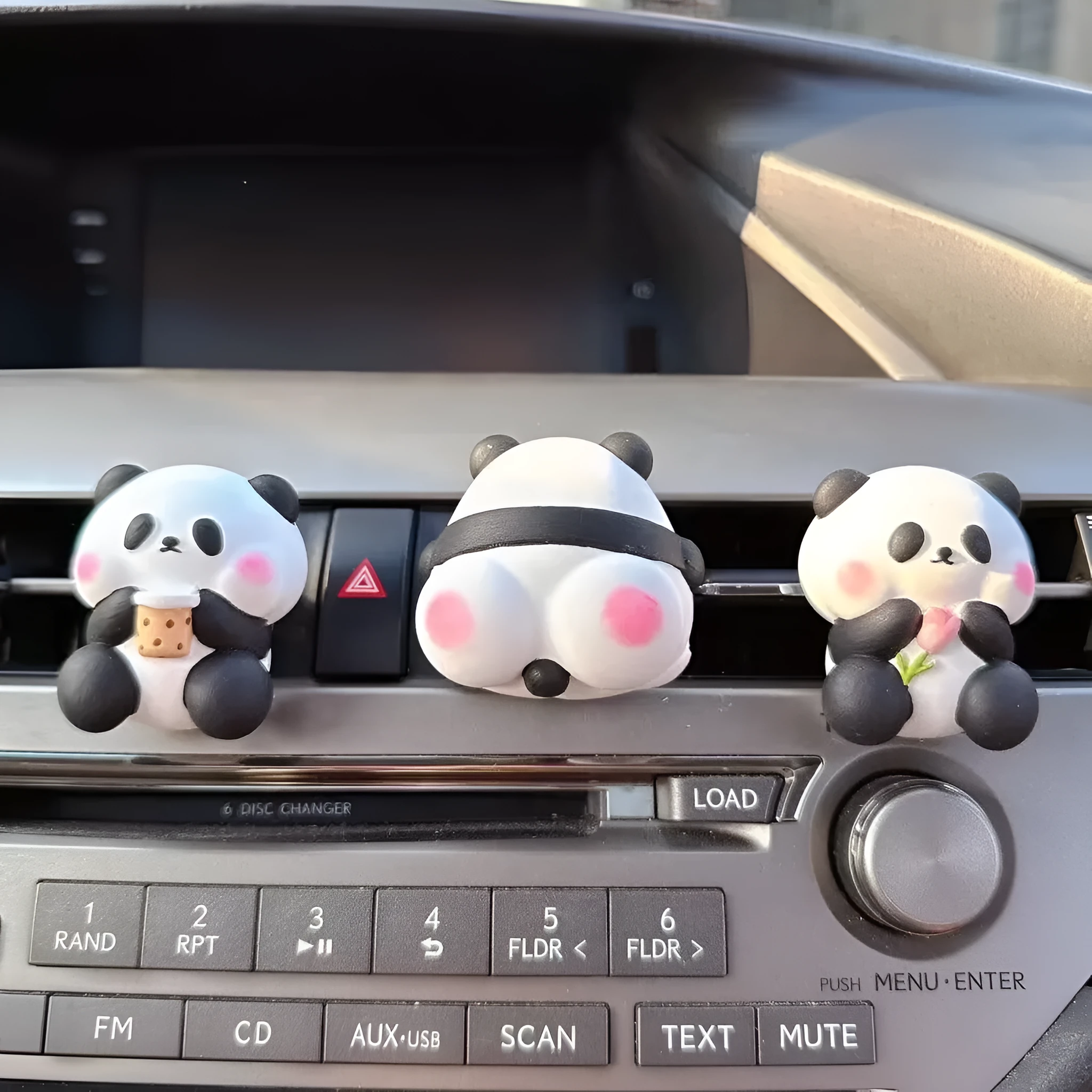 Cute panda-shaped car vent clip air freshener in three character designs: back, holding flower, and milk tea panda.
