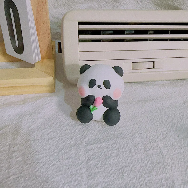 Cute panda-shaped car vent clip air freshener in three character designs: back, holding flower, and milk tea panda.