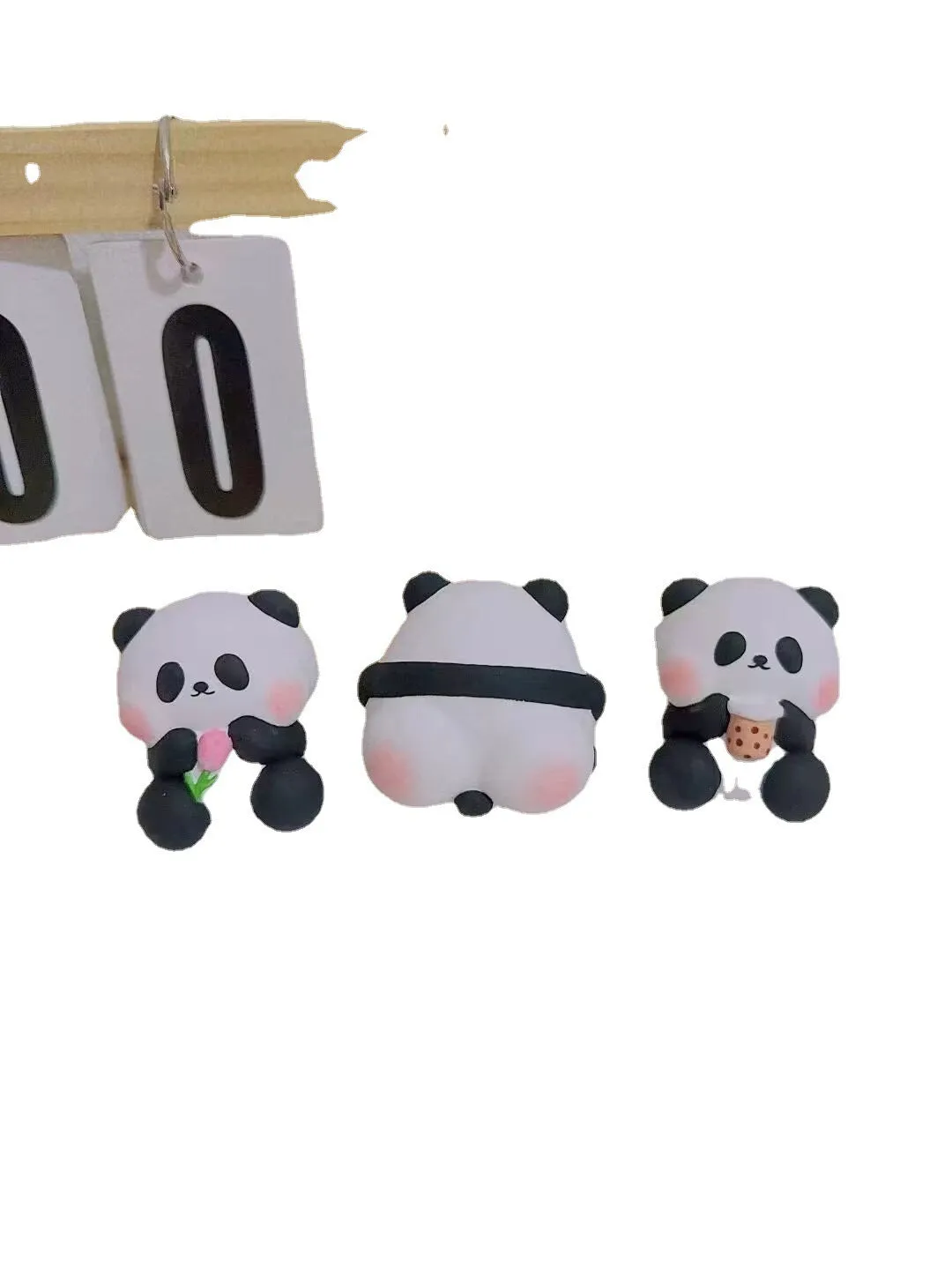 Cute panda-shaped car vent clip air freshener in three character designs: back, holding flower, and milk tea panda.