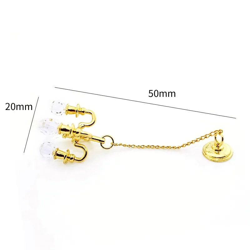Mini metal retro ceiling light photo prop decoration in gold and silver, 5cm by 2cm.