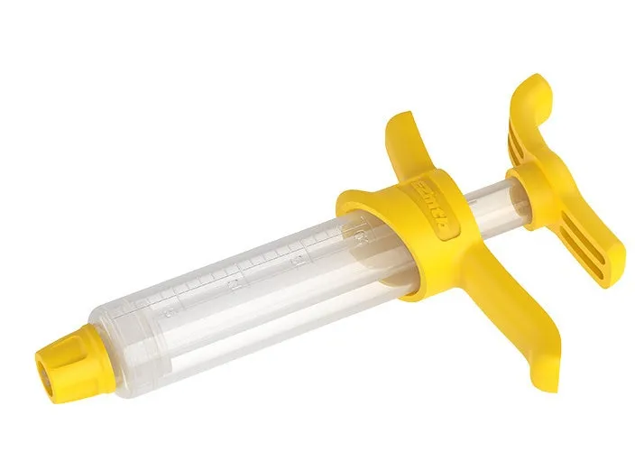 EZmtb bicycle hydraulic brake bleed kit with syringes, bottles, hoses, and metal adapters on a workbench.