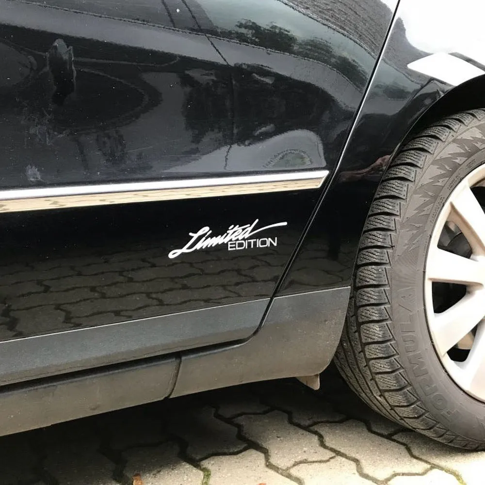 Reflective plastic bumper sticker for cars, showing black, white, and colourful design options.