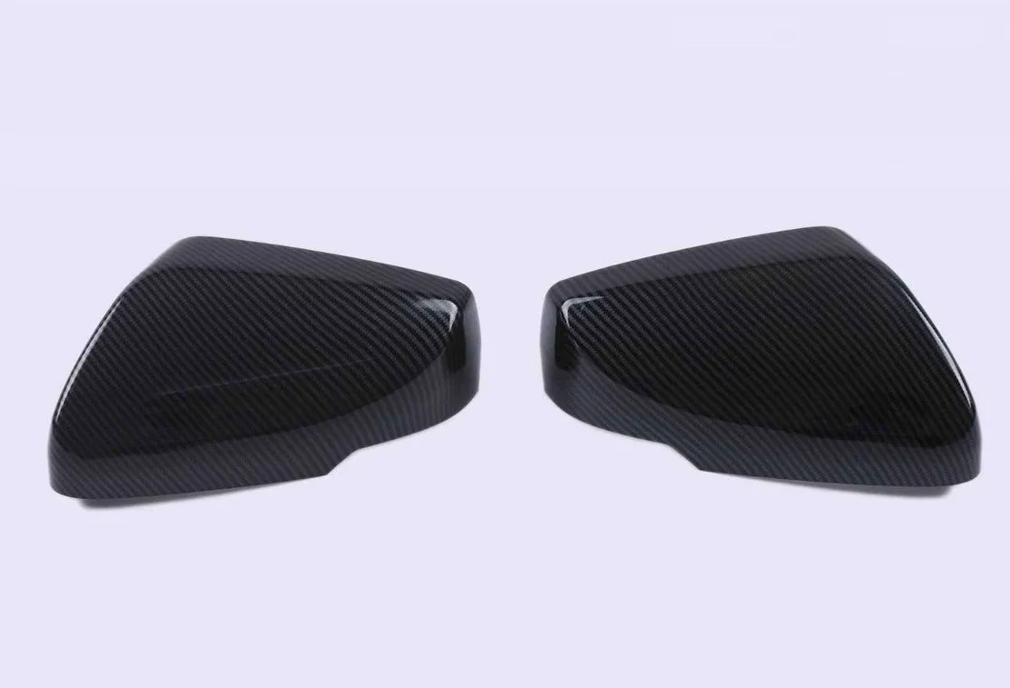 Set of ABS plastic mirror covers for Cadillac CT5 CT6 in carbon fibre, silver, and rain frame styles.