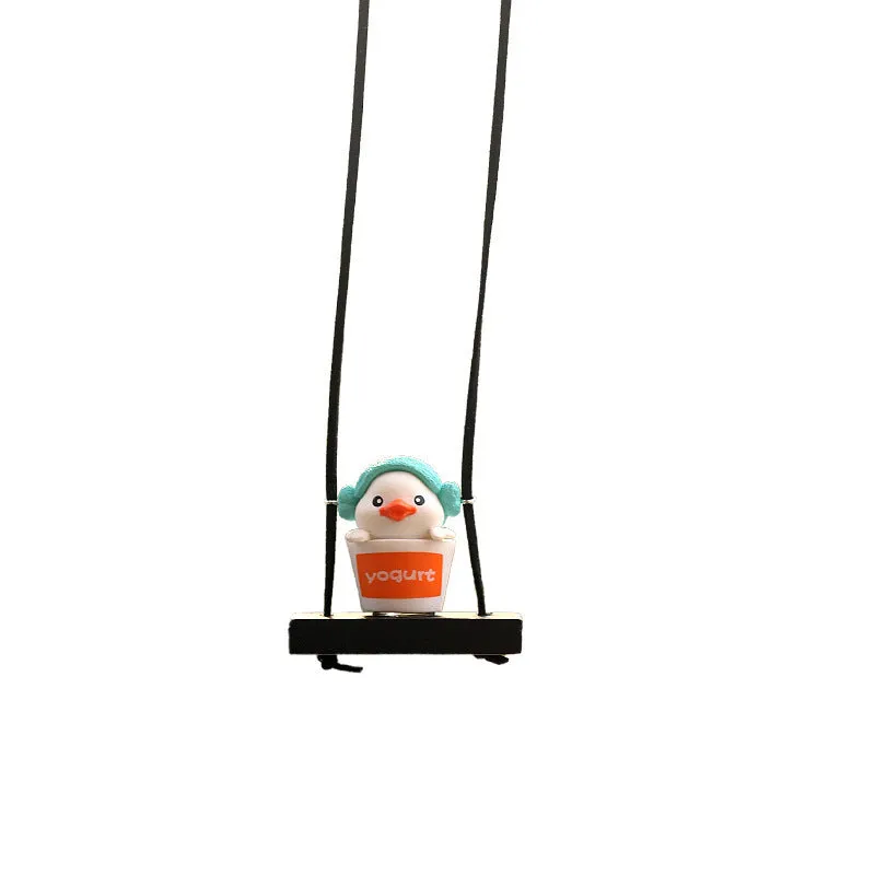 Cute little yellow plastic duck doll car hanging ornament in cartoon style.
