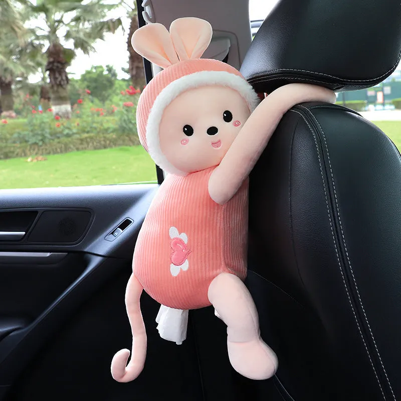 Plush car seat back tissue box holder with cute animal design mounted on car headrest