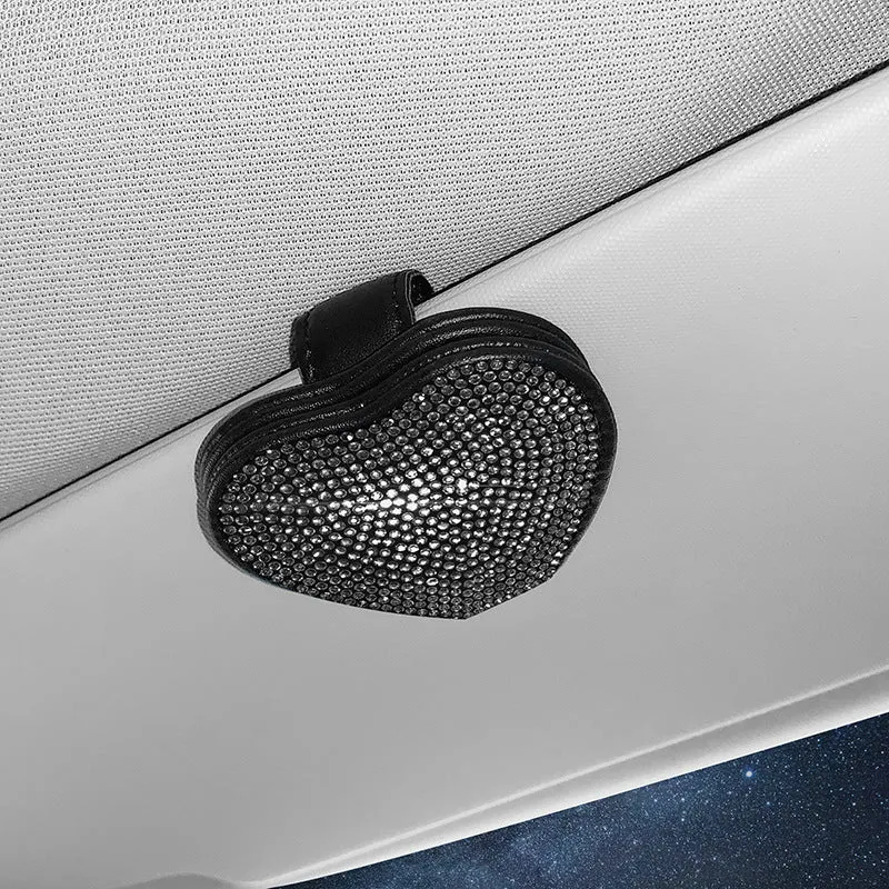 Magnetic PU leather car sun visor clip holding a pair of glasses, shown in a diamond-pattern colour.