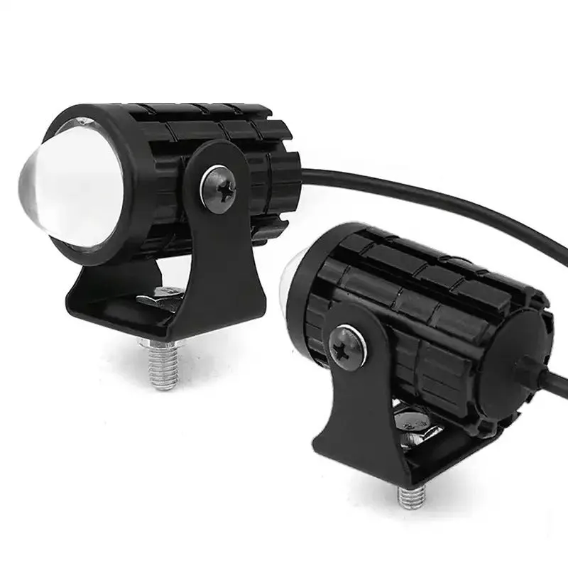 Motorcycle auxiliary spotlight with two-colour lens options, showing aluminium and polycarbonate housing.