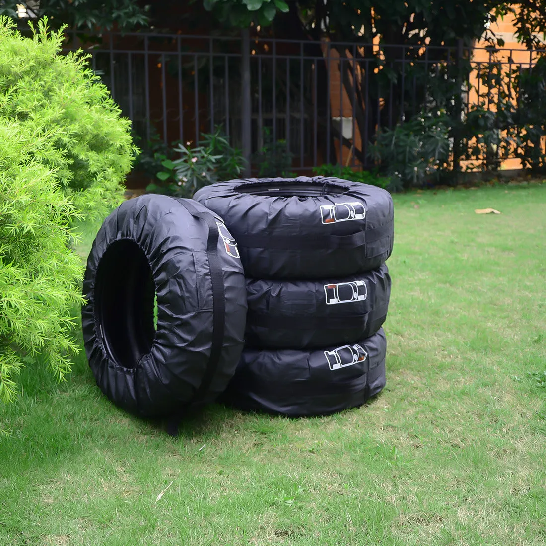 Black and red oxford cloth car tyre protective covers showing belt-style design with sizing labels