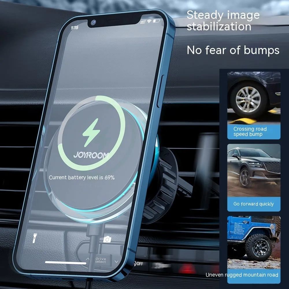 Black magnetic wireless charging stand attached to a car air vent, showing a smartphone secured on it.