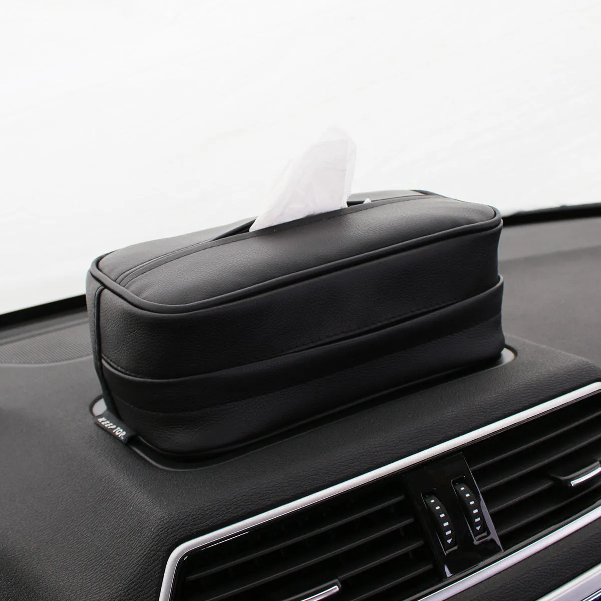 Black leather hanging storage box with a zip and PU strap, shown next to a beige medium sized box.