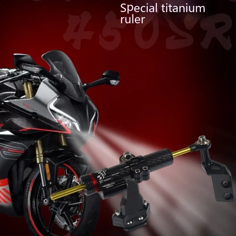 Titanium directional damper bracket with carbon fibre finish for CFMoto 450SR motorcycle.