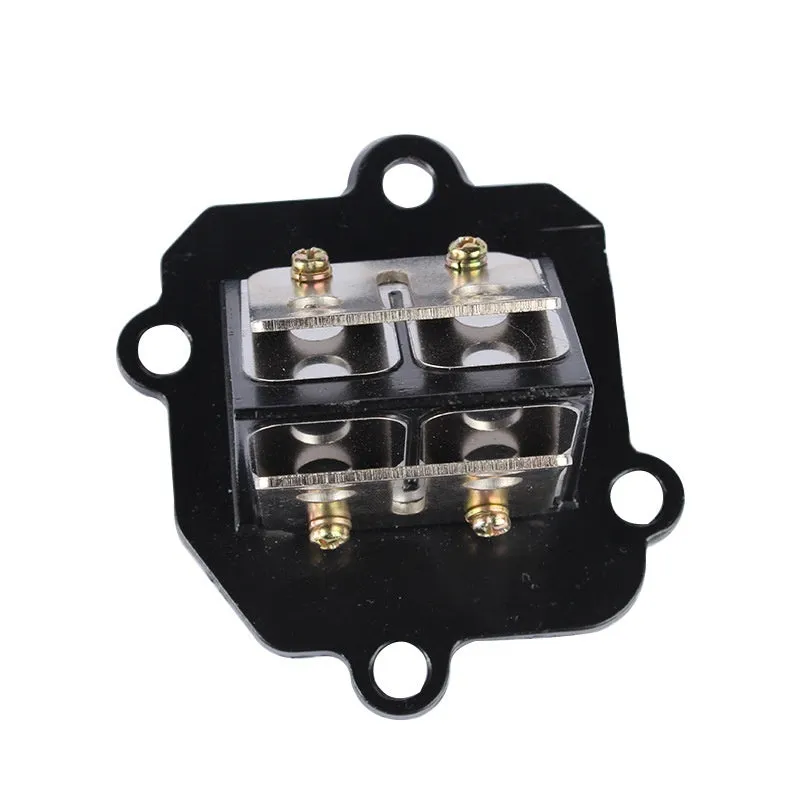 Green metal carburetor spring valve hair accessory on a white background.
