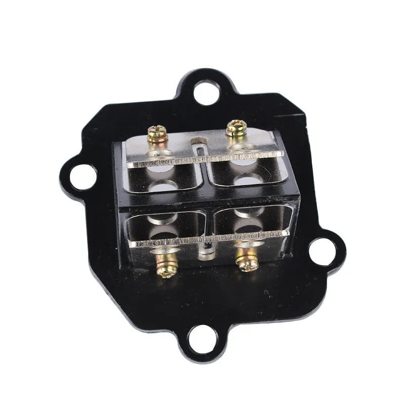 Green metal carburetor spring valve hair accessory on a white background.