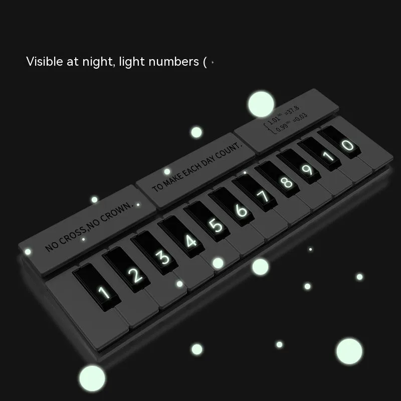 Black and white piano temporary parking sign measuring 148mm with plastic construction