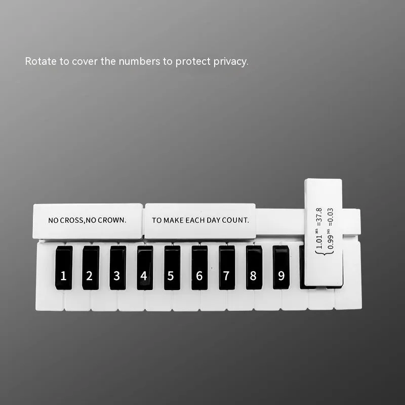 Black and white piano temporary parking sign measuring 148mm with plastic construction