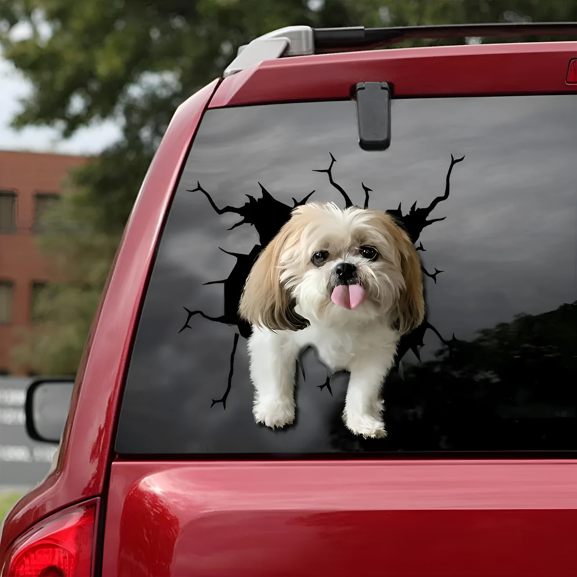 Reflective torn-body dog silhouette car window sticker in three sizes.