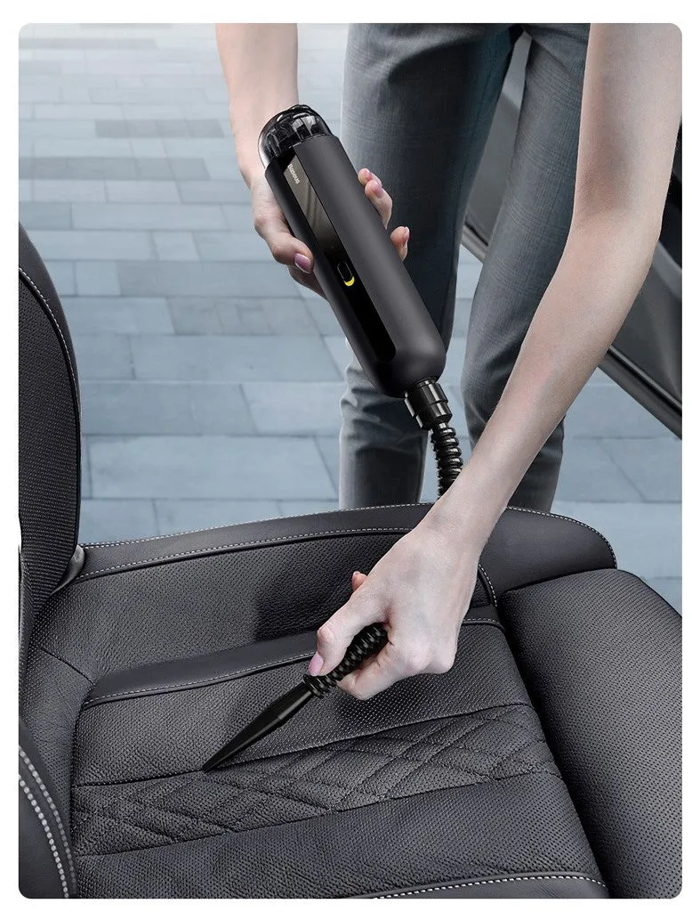 Baseus wireless handheld car vacuum cleaner in black, shown with blowing hose attachment and Type-C charging cable.